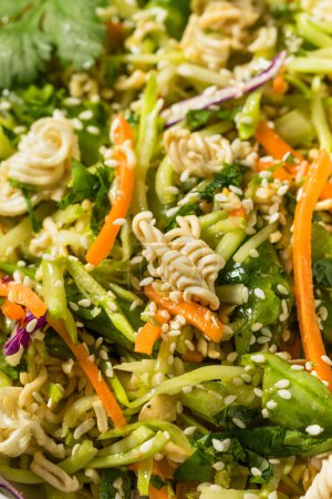 Photo for Raw Organic Asian Crunchy Ramen  Salad with Cabbage and Cilantro - Royalty Free Image
