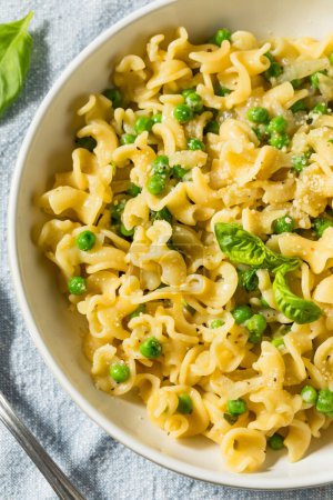 Photo for Italian Homemade Gigli Pasta Meal with Basil Cheese and Peas - Royalty Free Image