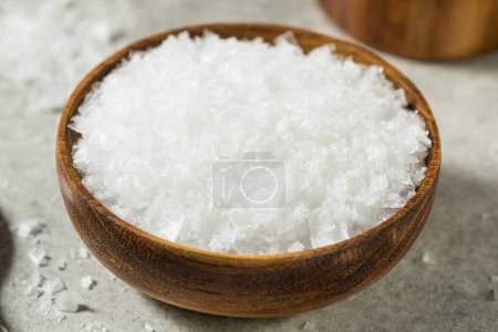 Photo for Organic White Maldon Sea Salt in a Bowl - Royalty Free Image