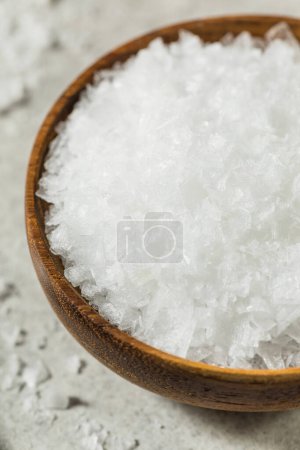 Photo for Organic White Maldon Sea Salt in a Bowl - Royalty Free Image