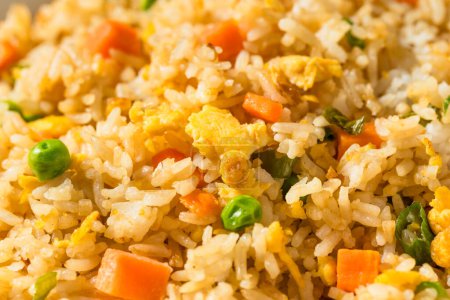 Photo for Homemade Chinese Asian Fried Rice with Peas and Carrots - Royalty Free Image