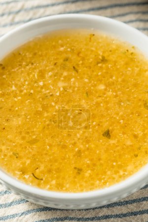 Photo for Homemade Sweet Italian Salad Dressing with Olive Oil Spices and Lemon - Royalty Free Image