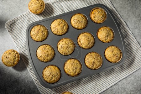 Photo for Whole Wheat Breakfast Bran Muffins Hot from the Oven - Royalty Free Image