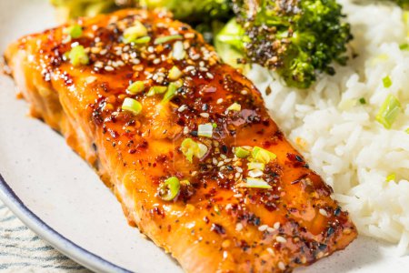 Photo for Healthy Homemade Baked Hot Honey Salmon with Rice and Broccoli - Royalty Free Image