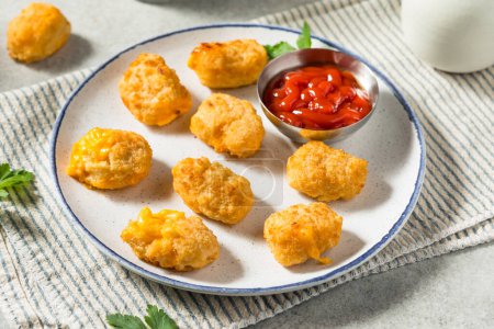 Photo for Deep Fried Macaroni and Cheese Bites with Ketchup for Dipping - Royalty Free Image