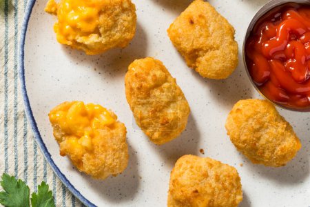Photo for Deep Fried Macaroni and Cheese Bites with Ketchup for Dipping - Royalty Free Image