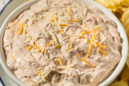 Photo for Homemade Taco Boat Dip Appetizer with Potato Chips - Royalty Free Image