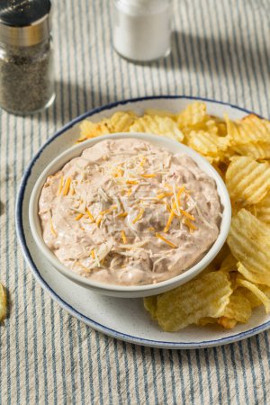 Photo for Homemade Taco Boat Dip Appetizer with Potato Chips - Royalty Free Image