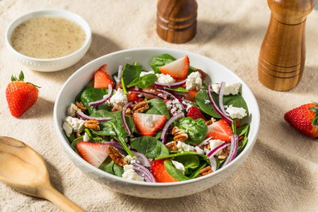 Photo for Healthy Homemade Strawberry Feta Spinach Salad with Poppyseed Dressing - Royalty Free Image