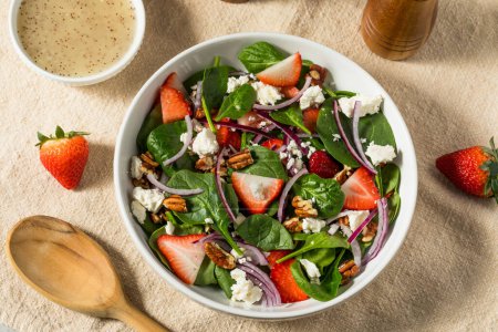 Photo for Healthy Homemade Strawberry Feta Spinach Salad with Poppyseed Dressing - Royalty Free Image