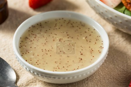 Photo for Homemade Healthy Poppyseed Dressing for a Green Salad - Royalty Free Image