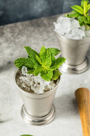 Refreshing Cold Iced Mint Julep Cocktail with Bourbon for the Derby