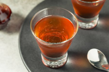 Photo for Boozy Bourbon Whiskey Manhattan Cocktail with a Cherry - Royalty Free Image
