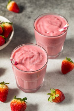 Photo for Healthy Red Organic Strawberry Smoothie with Almond Milk for Breakfast - Royalty Free Image