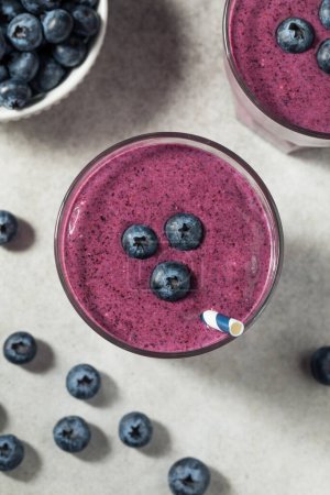 Photo for Frozen Cold Healthy Blueberry Smoothie with Almond Milk for Breakfast - Royalty Free Image