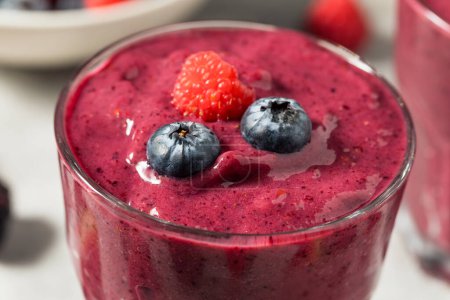 Photo for Healthy Refreshing Mixed Berry Breakfast Smoothie with Raspberries and Blueberries - Royalty Free Image