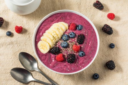 Photo for Homemade Healthy Berry Smoothie Bowl with Banana and Hemp - Royalty Free Image