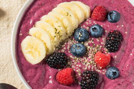 Photo for Homemade Healthy Berry Smoothie Bowl with Banana and Hemp - Royalty Free Image