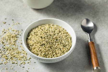 Photo for Raw Green Organic Hemp Seeds in a Bowl - Royalty Free Image