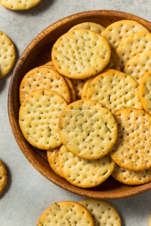 Photo for Assorted Round Whole Wheat Crackers in a Bowl - Royalty Free Image
