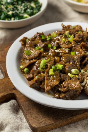 Photo for Spicy Korean Beef Bulgogi with Sauce and Scallions - Royalty Free Image