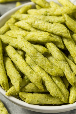 Photo for Fried Snap Pea Crisps Chips with Sea Salt - Royalty Free Image
