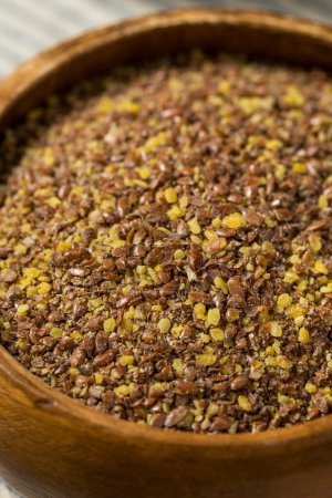 Photo for Organic Brown Dry Ground Flax Seeds in a Bowl - Royalty Free Image