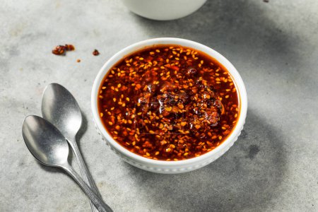 Photo for Spicy Hot Chili Crisp Oil in a Bowl - Royalty Free Image