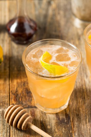 Refreshing Cold Tequila Honey Bee Cocktail with Lemon