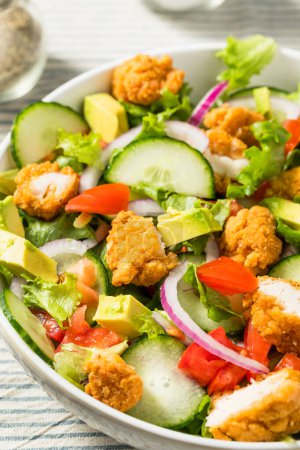 Healthy Homemade Fried Chicken Salad with Tomato and Cucumber
