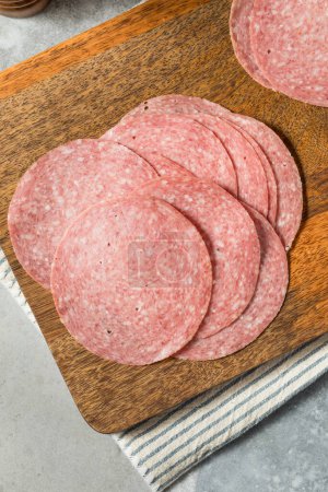 Photo for Red Italian Deli Salami Ready to Eat on a Sandwich - Royalty Free Image