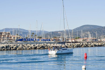 Photo for Breakwater port Cogolin winter day with mountain view yacht - Royalty Free Image