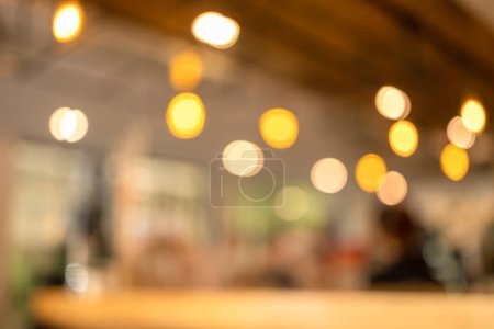 Photo for Blurred bokeh lighting in restaurant, bokeh light in coffee shop for background - Royalty Free Image