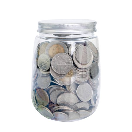 Foto de Billete de dinero tailandés y moneda en una alcancía, ahorrando concepto de dinero - Imagen libre de derechos