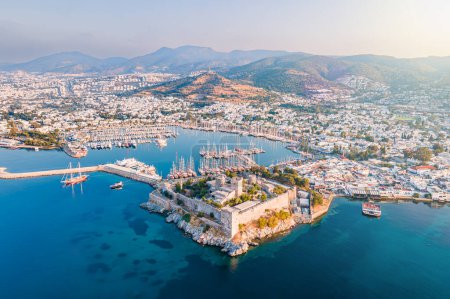 Photo for Aerial view of Bodrum ancient castle in resort town of Bodrum in Turkey at sunrise - Royalty Free Image