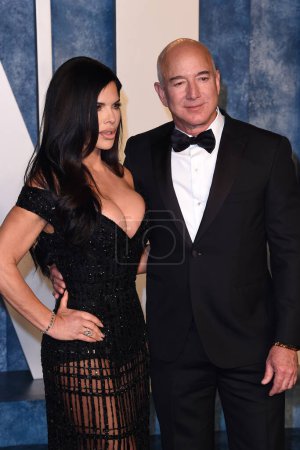 Photo for LOS ANGELES - MAR 12:  Lauren Sanchez, Jeff Bezos at the 2023 Vanity Fair Oscar Party at the Wallis Annenberg Center for the Performing Arts on March 12, 2023 in Beverly Hills, CA - Royalty Free Image