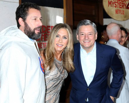Photo for LOS ANGELES - MAR 28:  Adam Sandler, Jennifer Aniston, Ted Sarandos at Murder Mystery 2 Premiere at the Village Theater on March 28, 2023 in Westwood, CA - Royalty Free Image