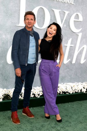 Photo for LOS ANGELES - APR 26:  Sebastian Roche, Alicia Hannah-Kim at the Love & Death TV Series Premiere at the Directors Guild of America on April 26, 2023 in Los Angeles, CA - Royalty Free Image