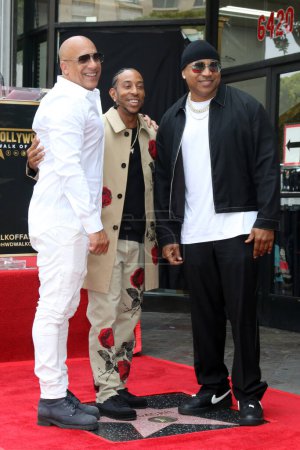 Photo for LOS ANGELES - MAY 18:  Vin DIesel, Chris Bridges aka Ludacris, LL Cool J at the Ludacris Star Ceremony on the Hollywood Walk of Fame on May 18, 2023 in Los Angeles, CA - Royalty Free Image