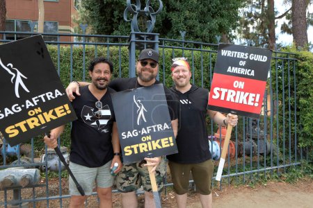Photo for LOS ANGELES - AUG 1:  Jon Huertas, Drew Powell, Keith Andreen, Disney at SAG/AFTRA and WGA Strike outside at the Walt Disney Studios on August 1, 2023 in Burbank, CA - Royalty Free Image