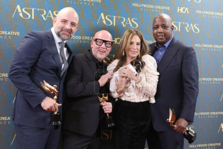 Photo for LOS ANGELES - JAN 6:  Joaquim Dos Santos, Justin Thompson, Guest, Kemp Powers at the 7th Astra Film Awards at the Biltmore Hotel on January 6, 2024 in Los Angeles, CA - Royalty Free Image