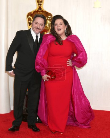 Photo for LOS ANGELES - MAR 10:  Ben Falcone, Melissa McCarthy at the 96th Academy Awards Arrivals at the Dolby Theater on March 10, 2024 in Los Angeles, CA - Royalty Free Image