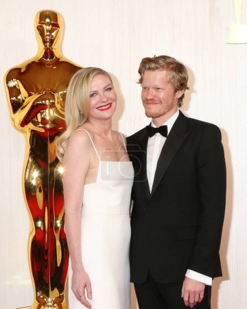 Photo for LOS ANGELES - MAR 10:  Kirsten Dunst, Jesse Plemons at the 96th Academy Awards Arrivals at the Dolby Theater on March 10, 2024 in Los Angeles, CA - Royalty Free Image