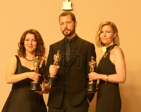 Photo for LOS ANGELES - MAR 10:  Raney Aronson-Rath, Mstyslav Chernov, Michelle Mizner at the 96th Academy Awards Press Room at the Dolby Theater on March 10, 2024 in Los Angeles, CA - Royalty Free Image