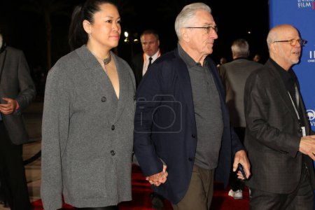 Photo for LOS ANGELES - JAN 4:  Robert De Niro, Tiffany Chen at the 2024 Palm Springs International Film Festival Gala Arrivals at the Palm Springs Convention Center on January 4, 2024 in Palm Springs, CA - Royalty Free Image