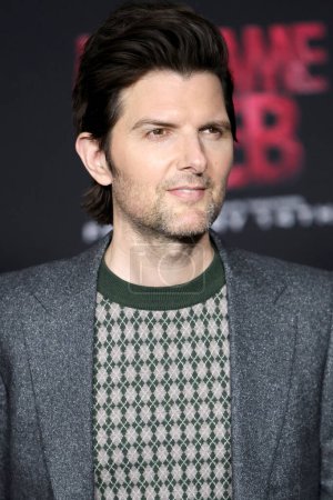 Photo for LOS ANGELES - FEB 12:  Adam Scott at the Madame Web Premiere at the Village Theater on February 12, 2024 in Westwood, CA - Royalty Free Image