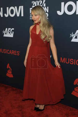 Photo for LOS ANGELES - FEB 2:  Sabrina Carpenter at the 2024 MusiCares Person of the Year Honoring Jon Bon Jovi at the Convention Center on February 2, 2024 in Los Angeles, CA - Royalty Free Image