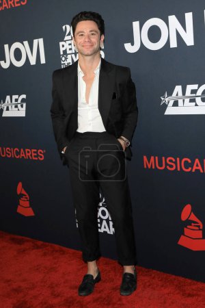 Photo for LOS ANGELES - FEB 2:  Sasha Farber at the 2024 MusiCares Person of the Year Honoring Jon Bon Jovi at the Convention Center on February 2, 2024 in Los Angeles, CA - Royalty Free Image