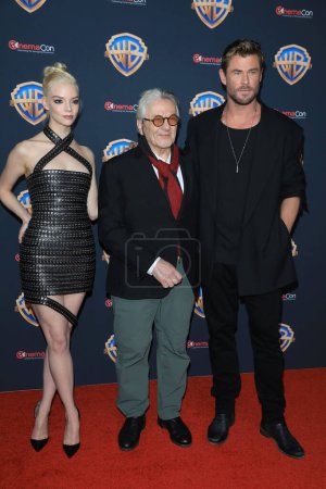 Photo for Anya Taylor-Joy, George Miller, Chris Hemsworth at the Warner Brothers CinemaCon Press Line at the Caesar's Palace Theatre on April 9, 2024 in Las Vegas, CA - Royalty Free Image