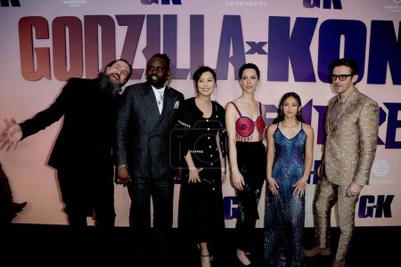 Photo for LOS ANGELES - MARCH 24:  Adam Wingard, Brian Tyree Henry, Fala Chen, Rebecca Hall, Kaylee Hottle, Dan Stevens at the "Godzilla x Kong: The New Empire" World Premiere at the TCL Chinese Theater IMAX on March 24, 2024 in Los Angeles, CA - Royalty Free Image
